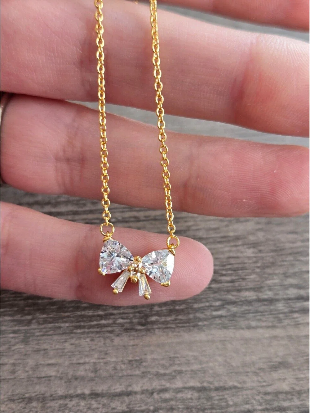 Sparkling bow necklace and earring set pandora gold plated